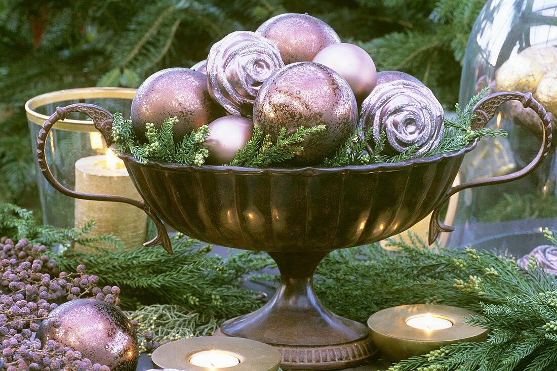 Christmas baubles in a pedestal bowl