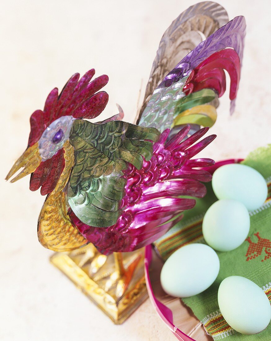 Mexican tin rooster with coloured eggs