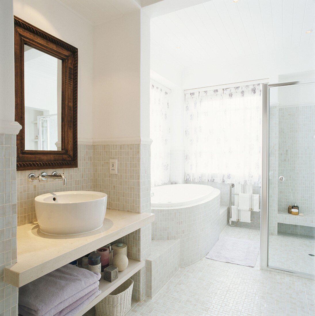 View into bathroom with wash basin & bath