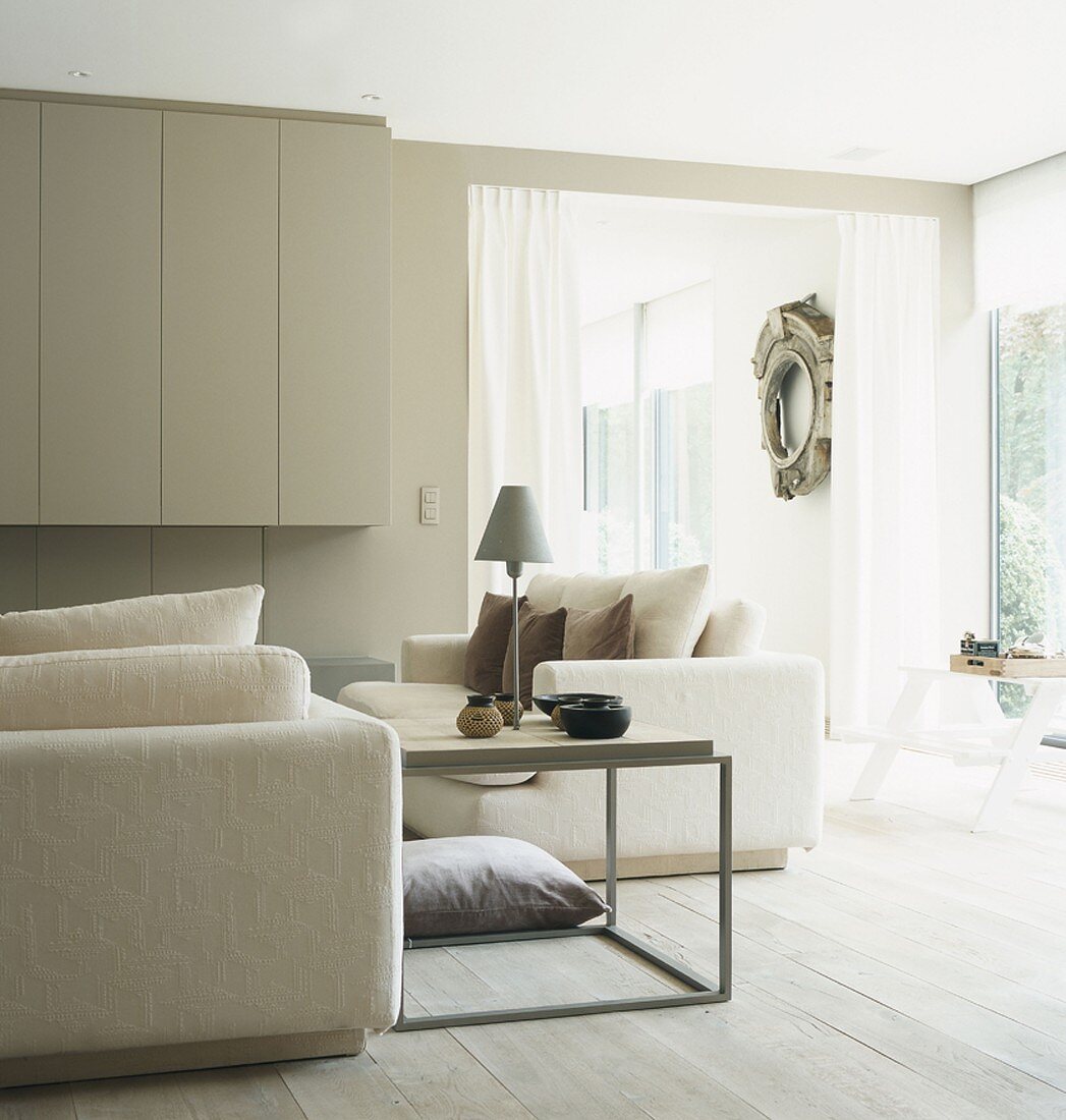 A sitting room with a cupboard