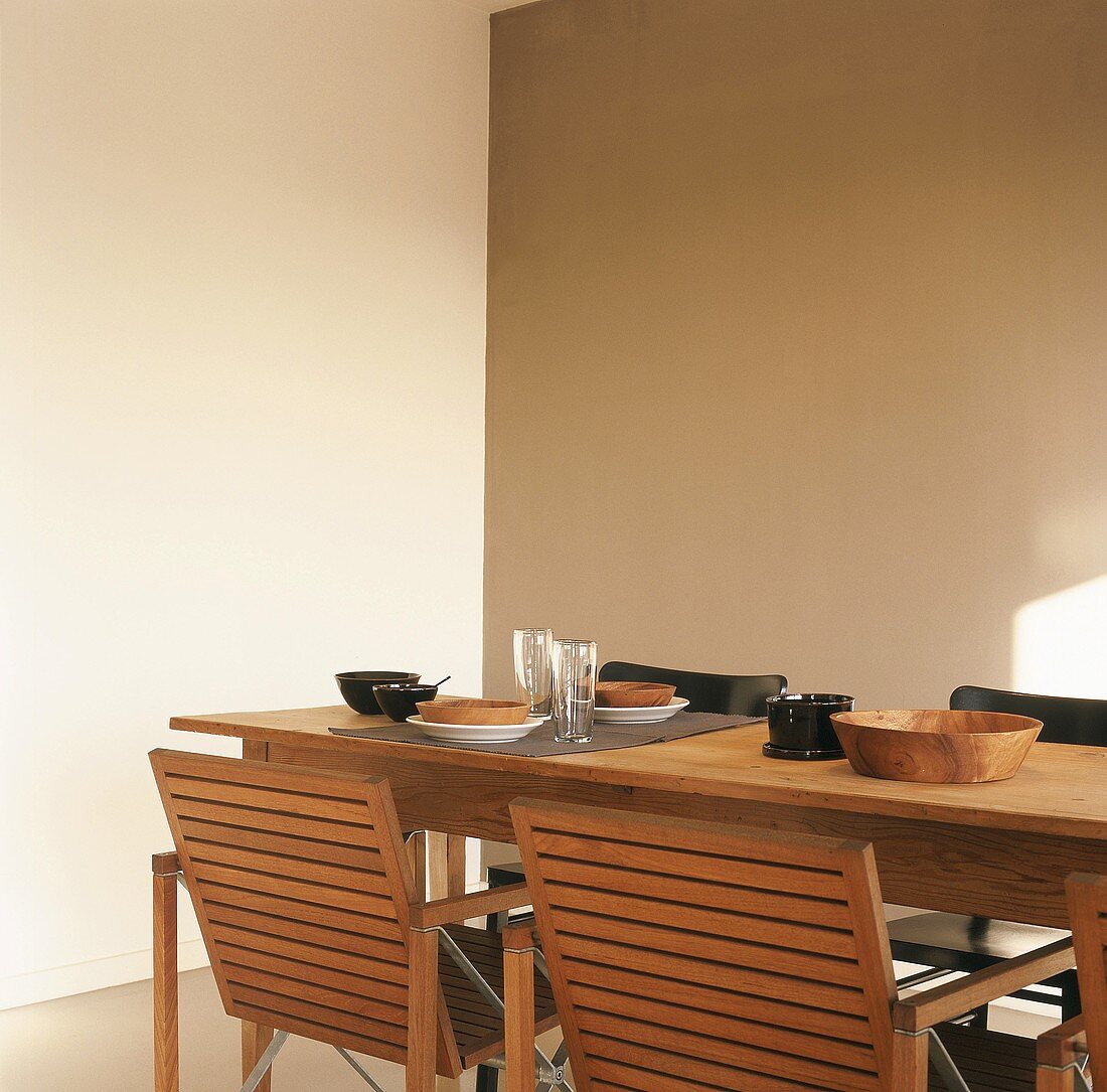 Bowls and glasses on laid table