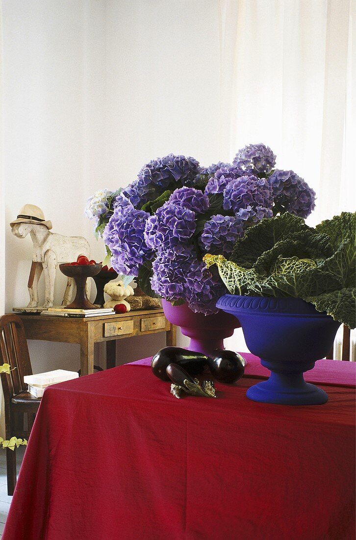 Decorative flowers and vegetable on a table