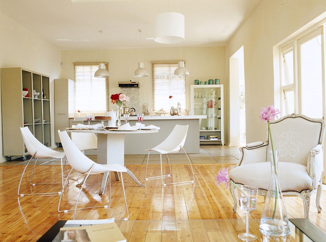 Dining table with kitchen in background