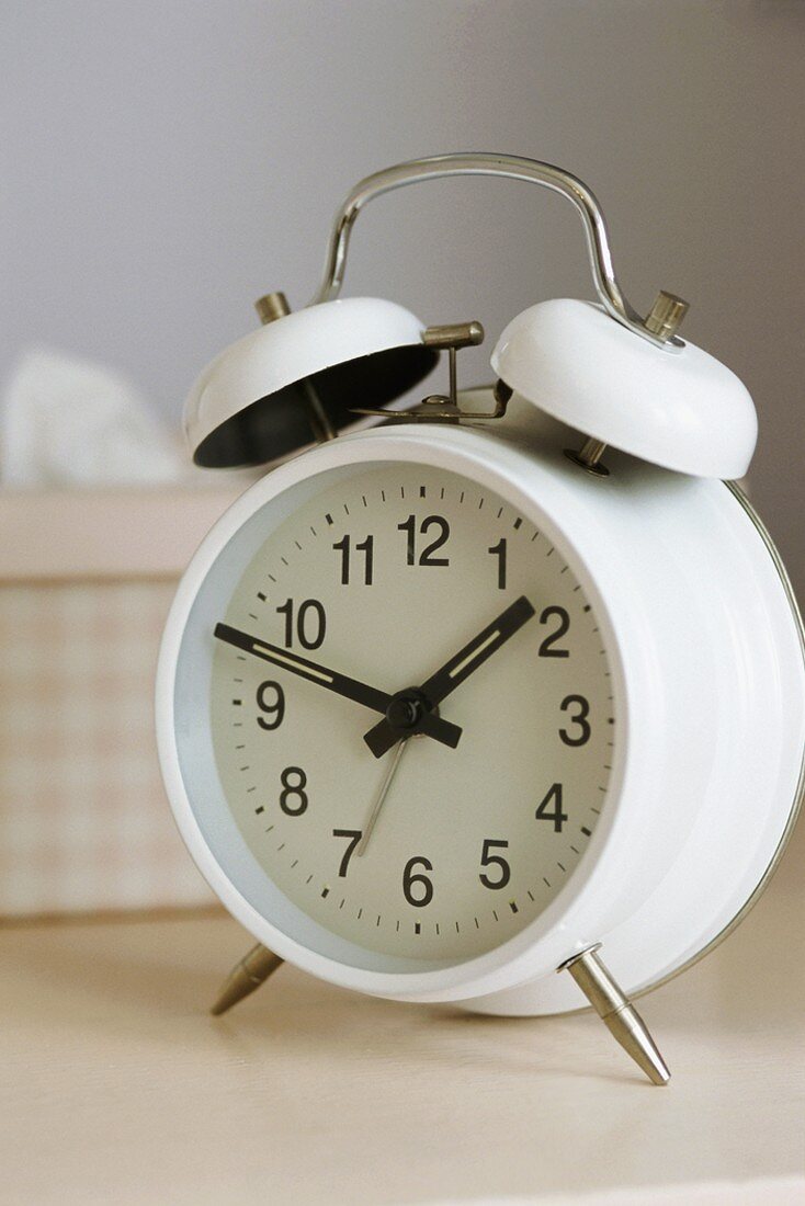 Alarm clock on surface