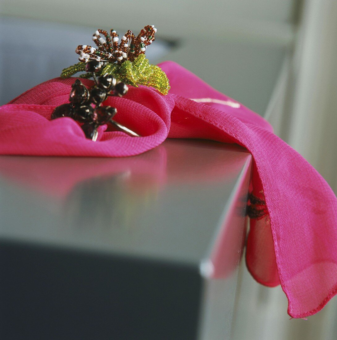Jewellery on pink scarf