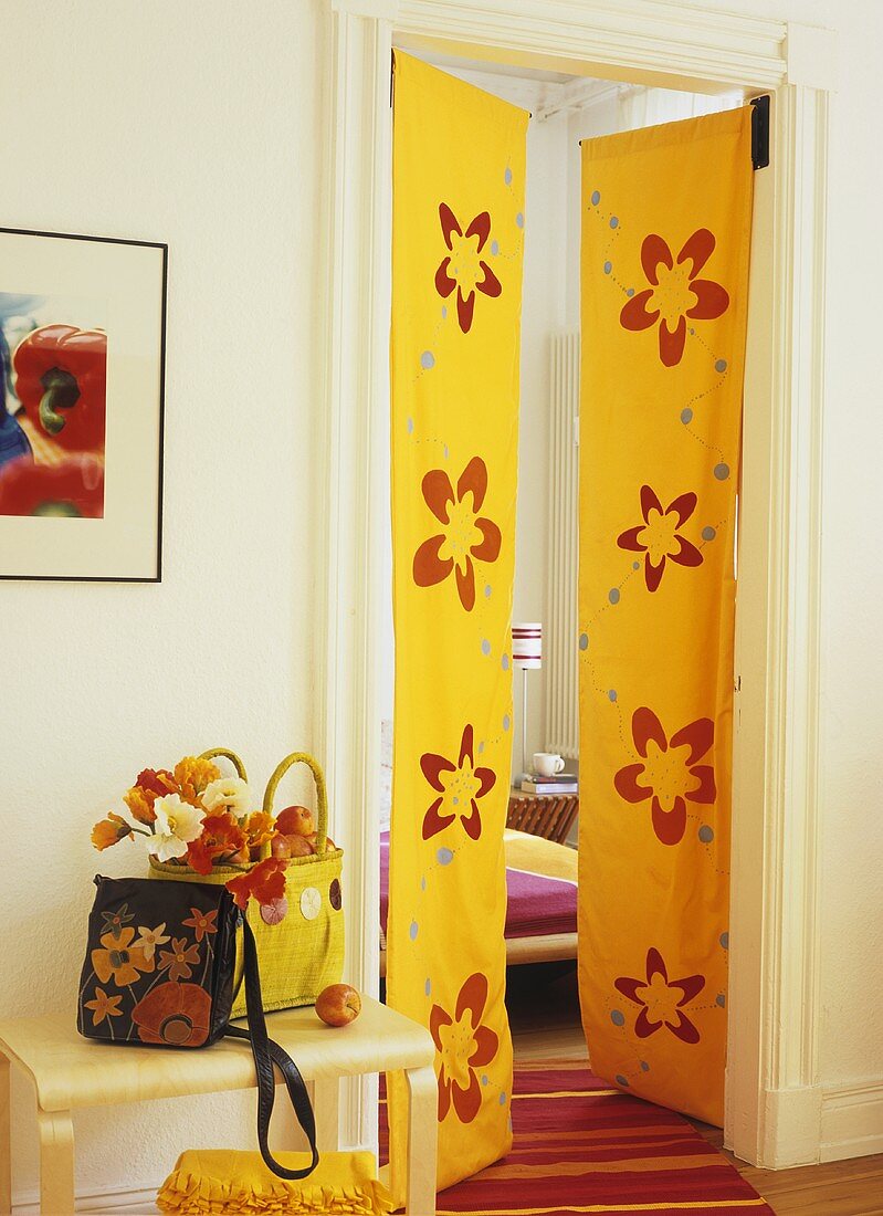 Colourful painted curtains instead of door