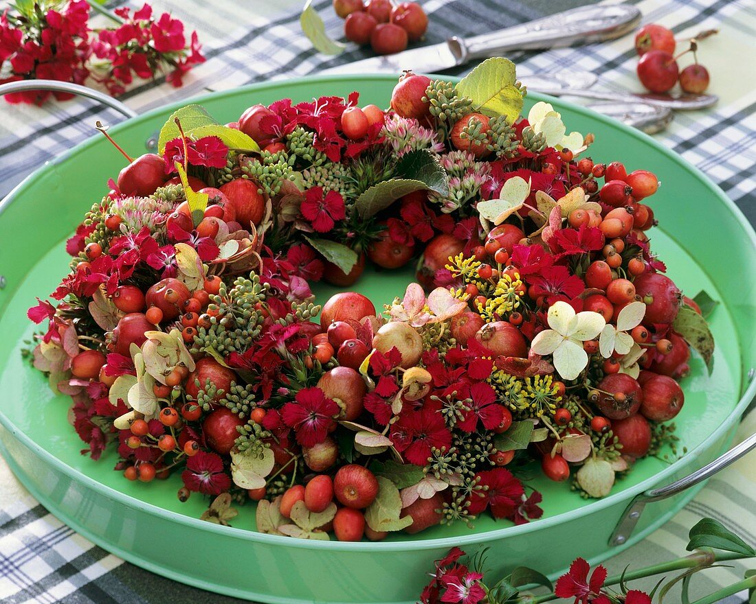 Wreath of hydrangeas, rose hips, fennel and sweet williams