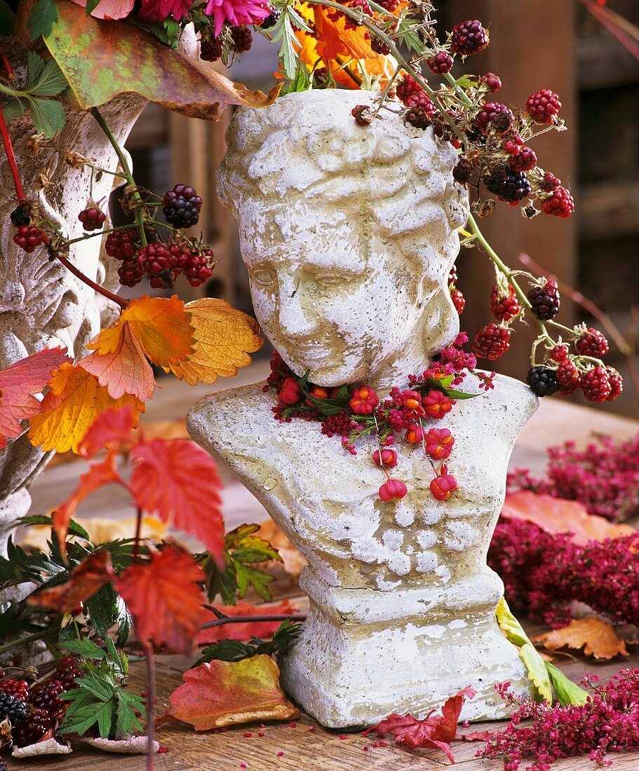 Bust decorated with spindle fruits, blackberries & bell heather