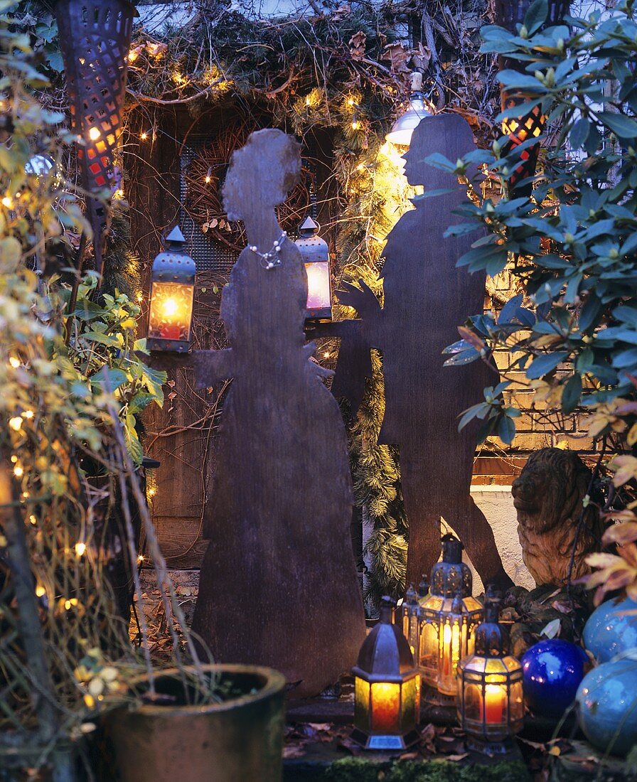 Garden decorated for Christmas with metal figures