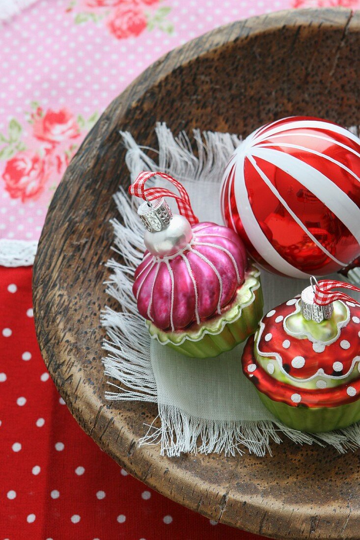 Christmas decorations in a wooden bowl