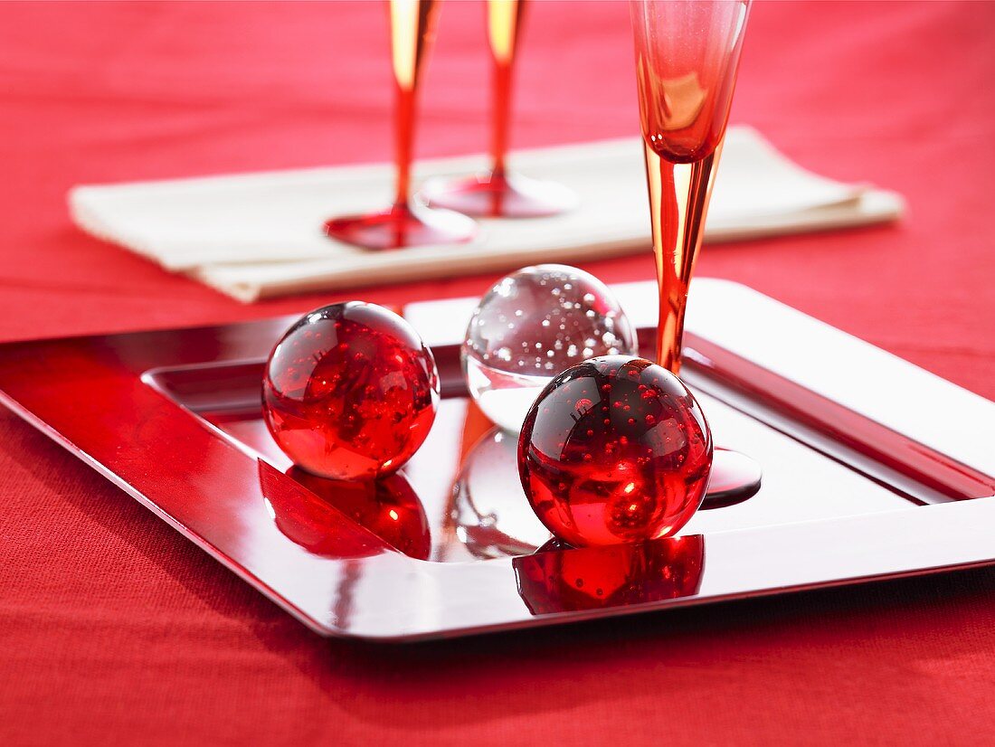 Red and white glass balls as table decoration