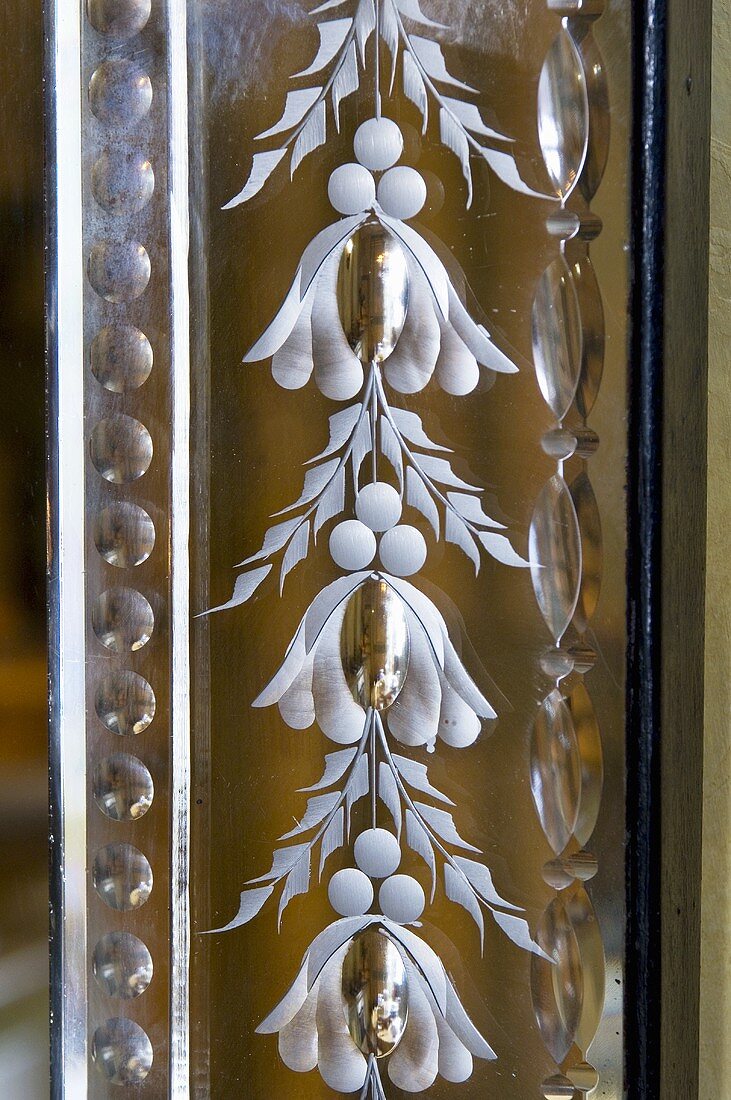Decorated mirror frame (close-up)