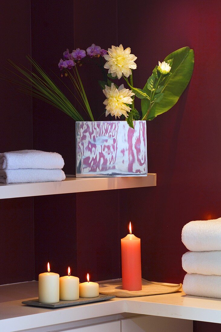 Candles, towels and flowers