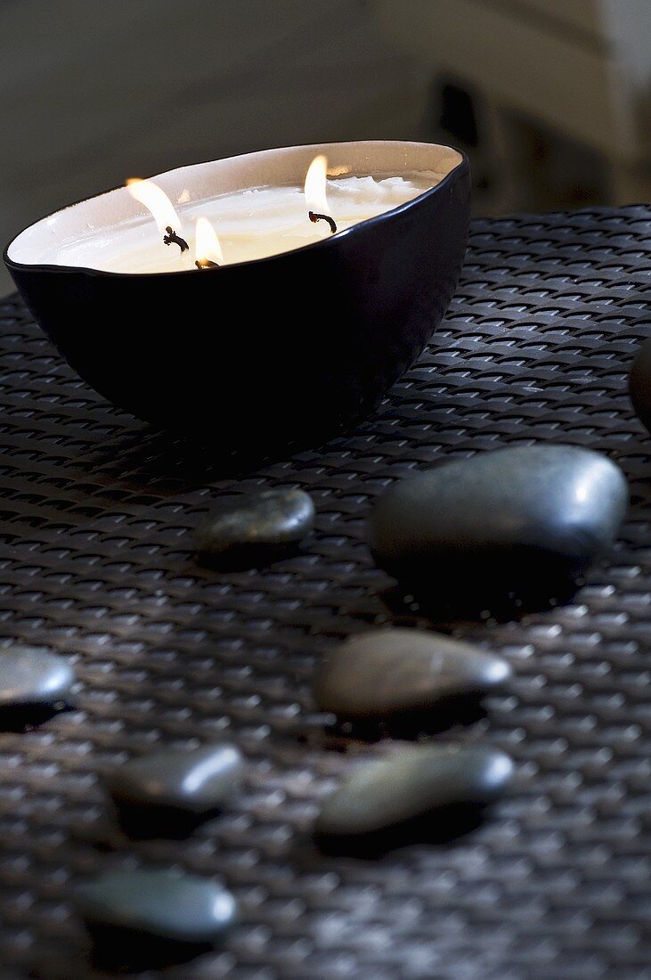 Candle bowl and pebbles