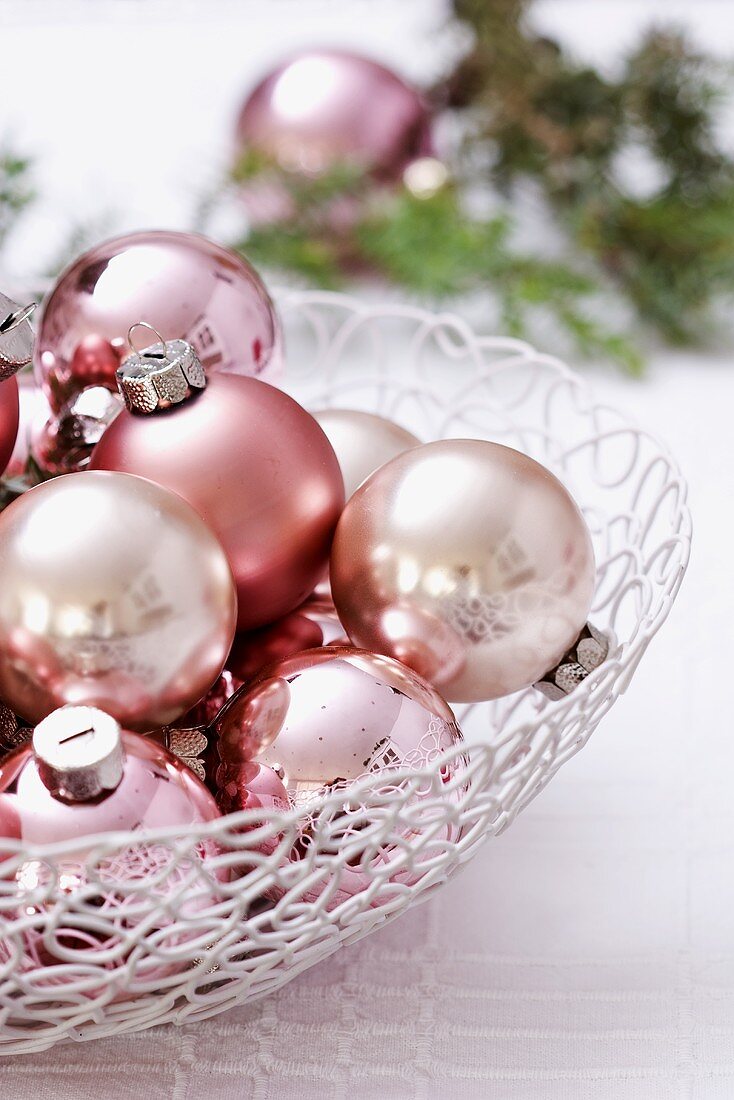 Christmas baubles in wire basket