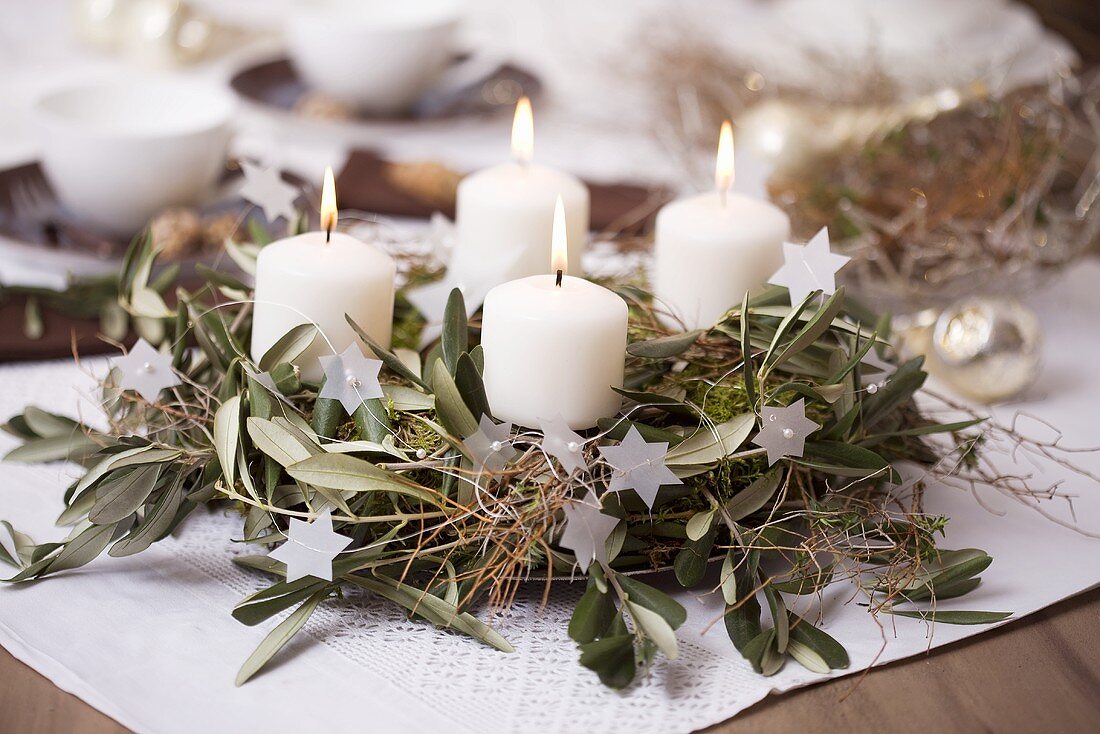 Advent wreath of olive sprigs and euphorbia branches