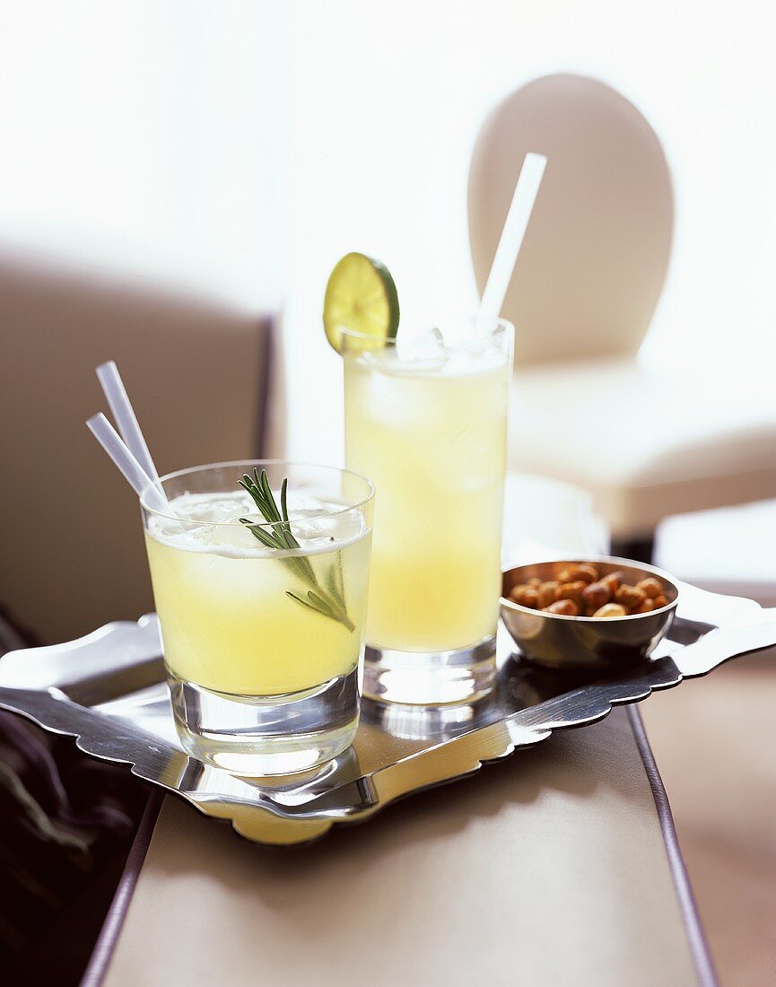 Lemon and pineapple cocktails with rum and nuts