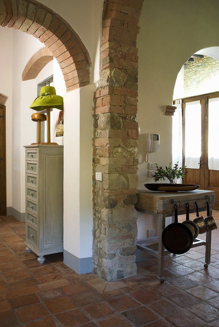 Foyer in a country home with brick arches