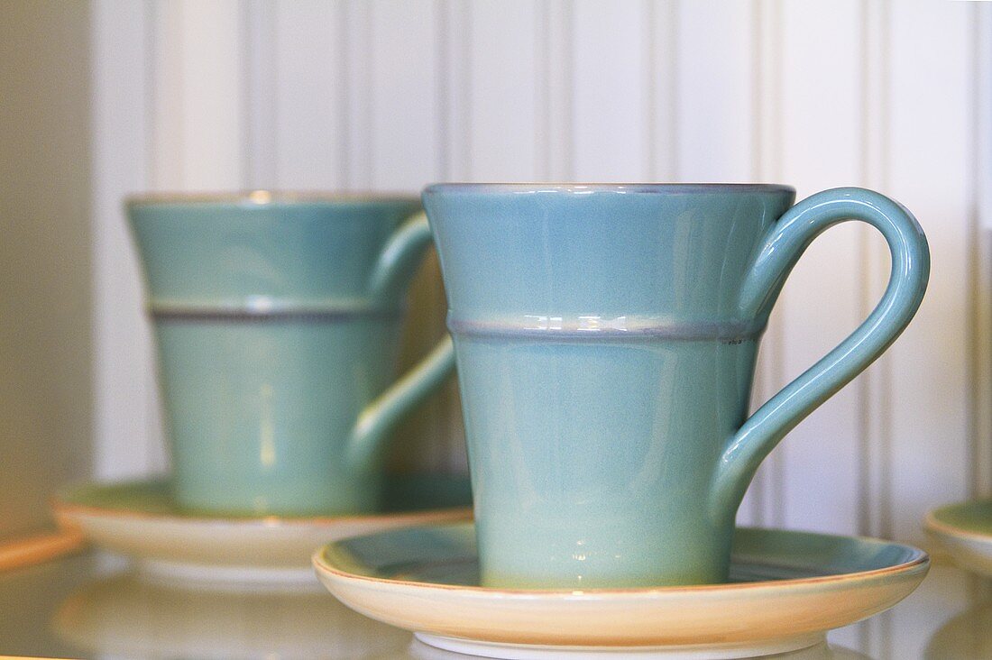 Blue Ceramic Mugs with Saucers