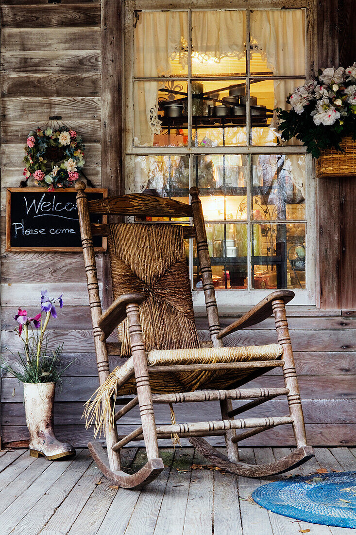 Old Wooden Rocking Chair on a Wooden Porch, Louisiana, USA