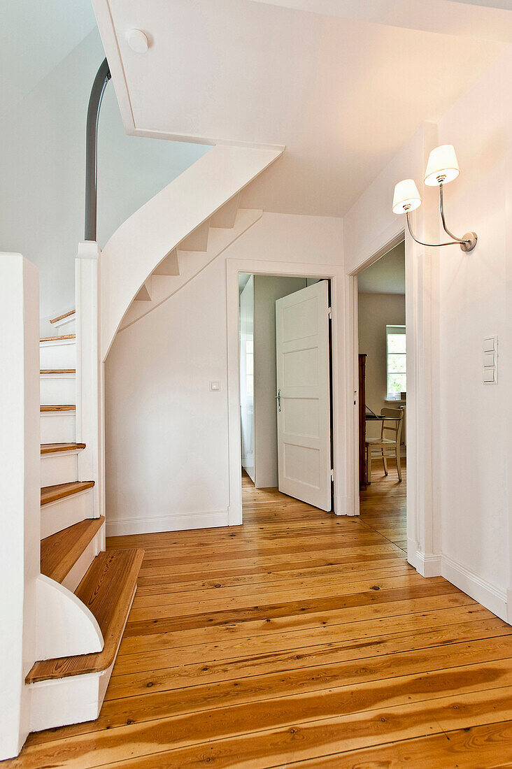 Entrance hall with stairs, House furnished in country style, Hamburg, Germany