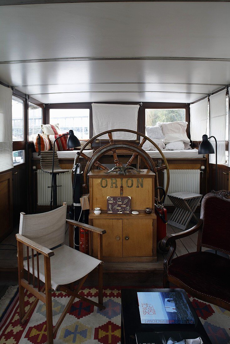 Steering wheel in the lounge of a house boat