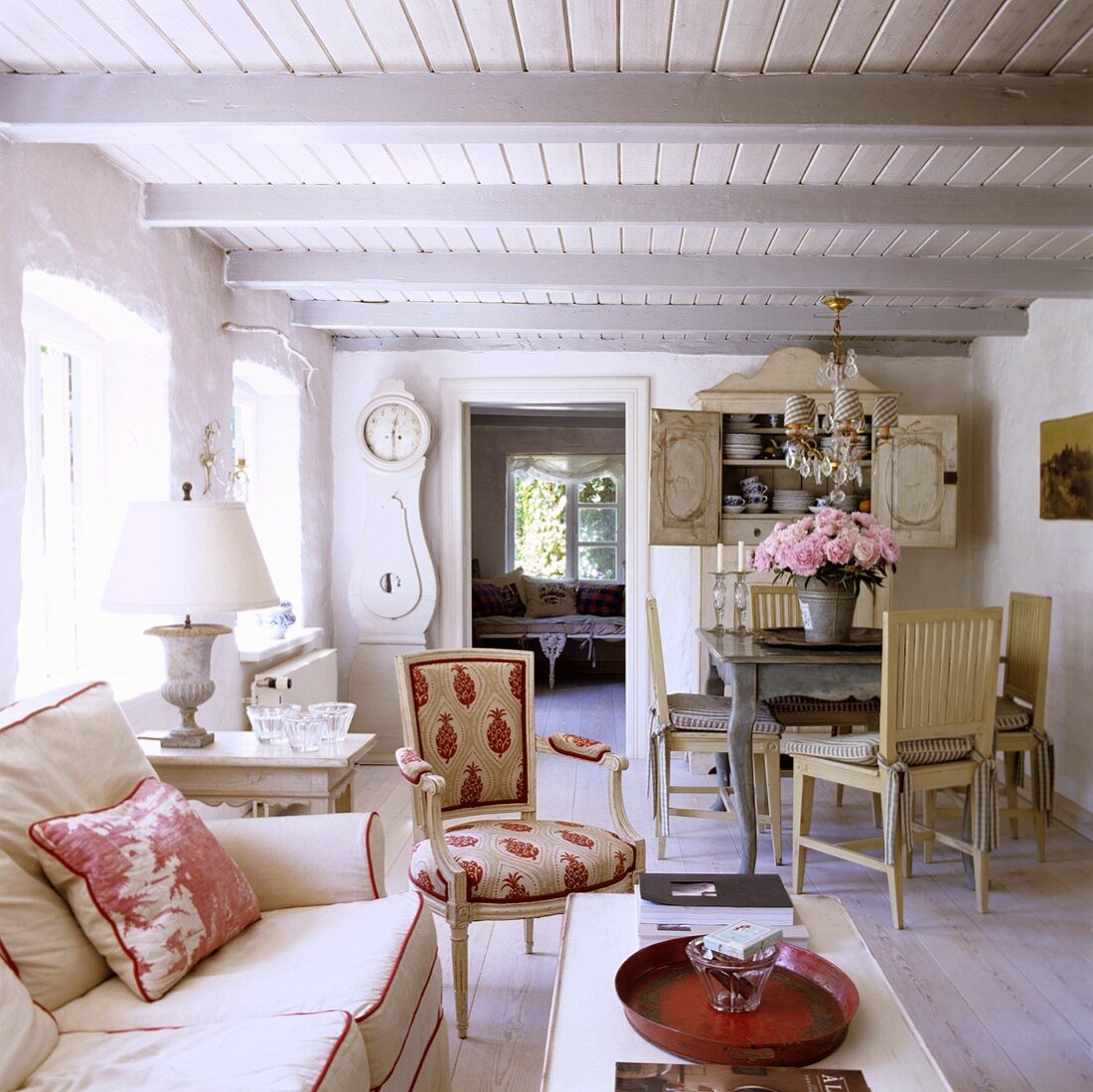 A living room in a 19th century German thatched-roof house decorated in a Scandinavian style