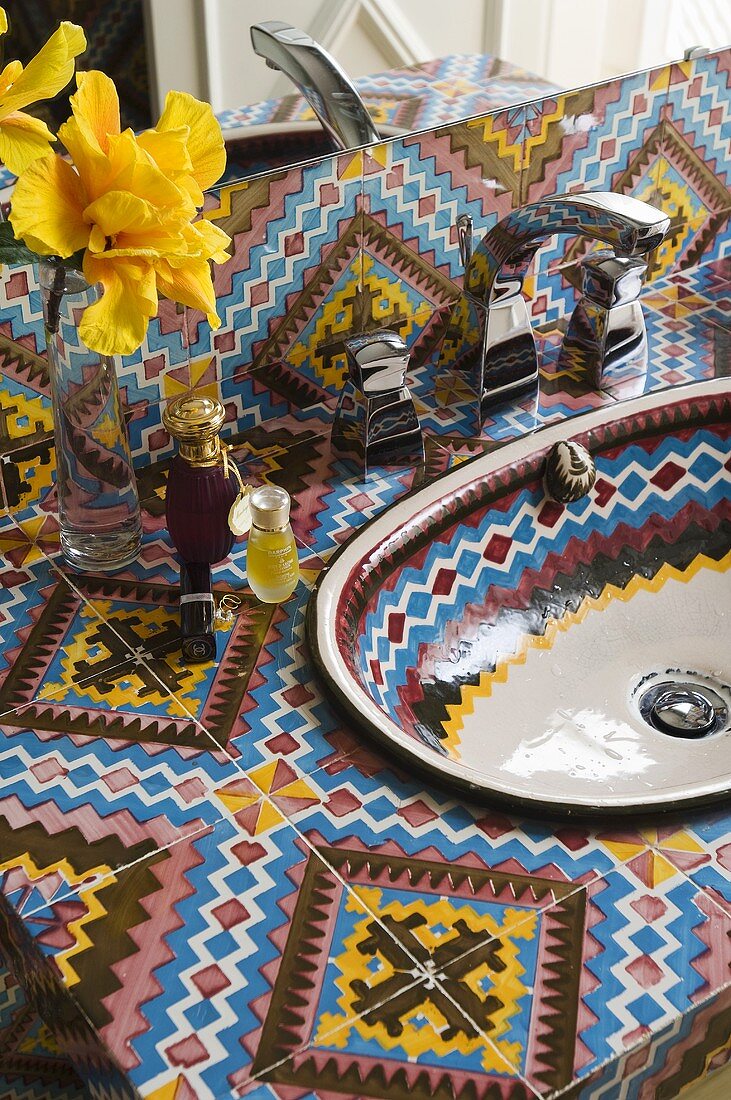 A washstand with a basin in a geometric Mediterranean pattern