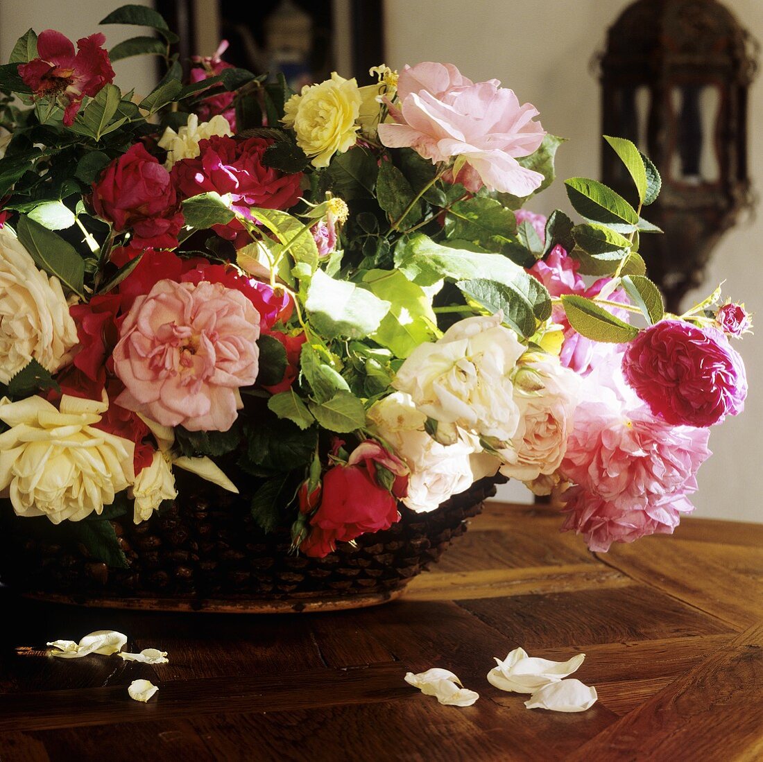 A bunch of roses on a wooden surface