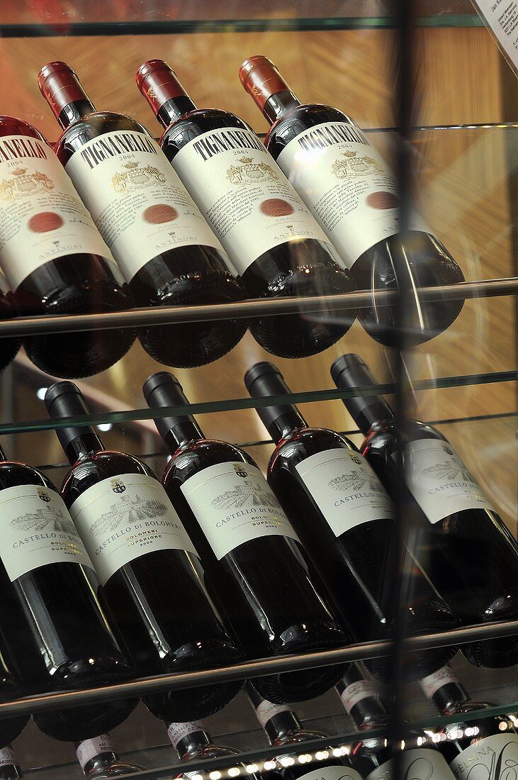 Wine displayed on a glass shelf