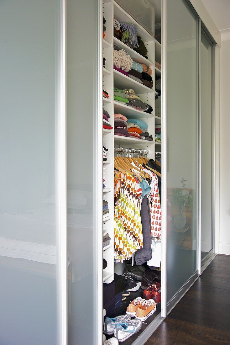 Fitted wardrobes in modern bedroom