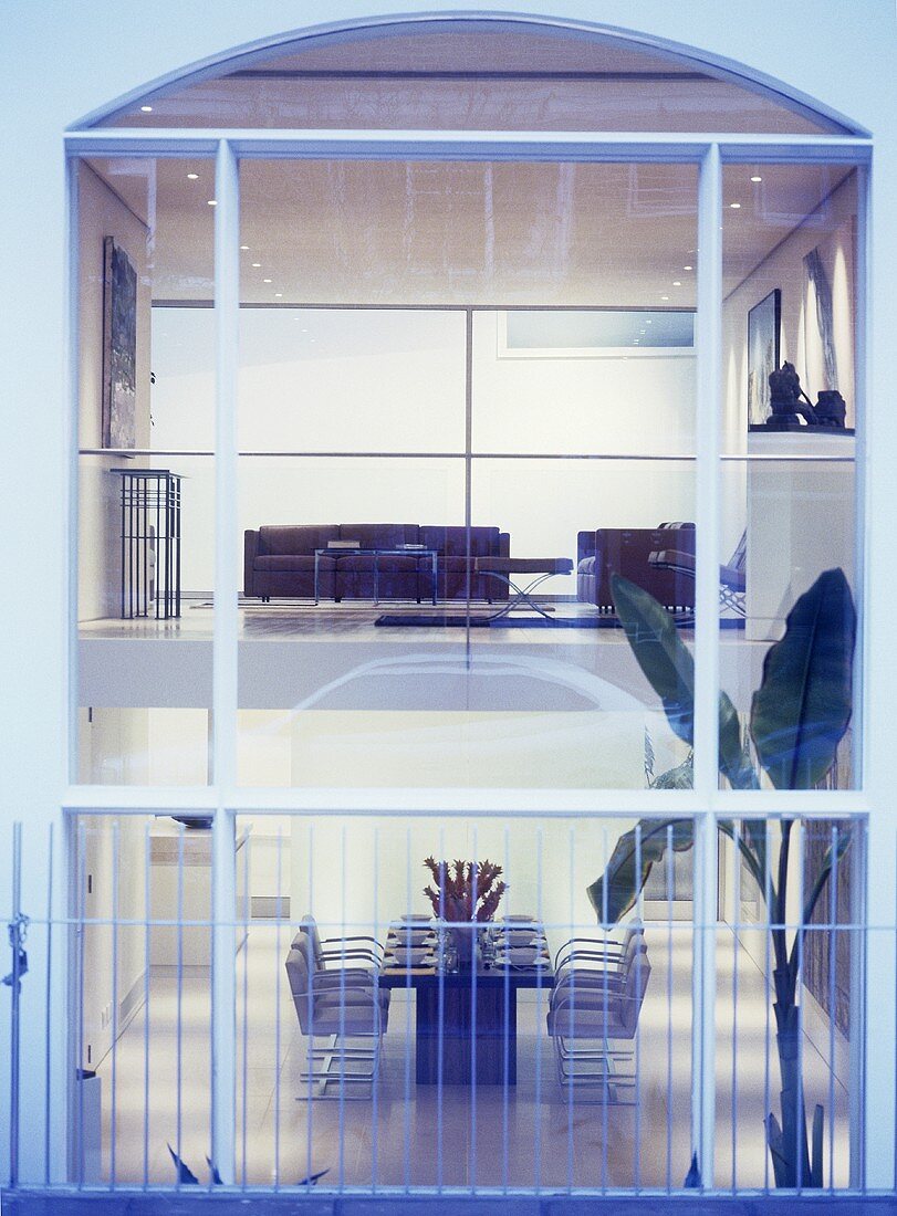 View through window into split level living space.
