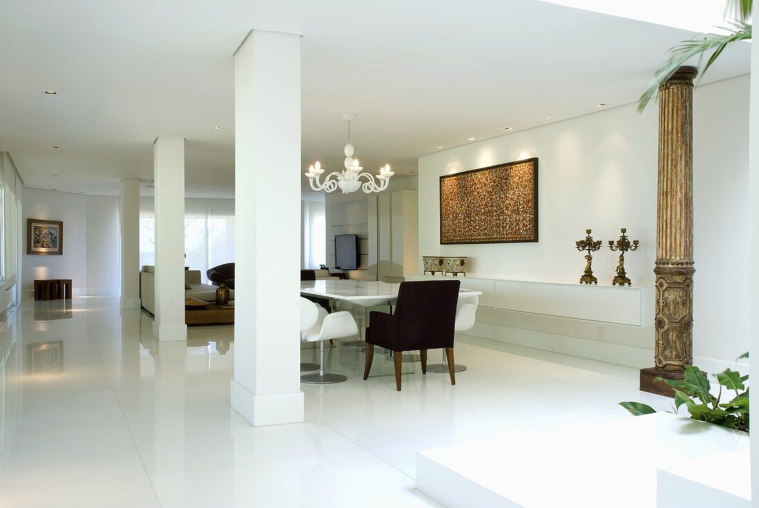 An elegant hallway with a dining area
