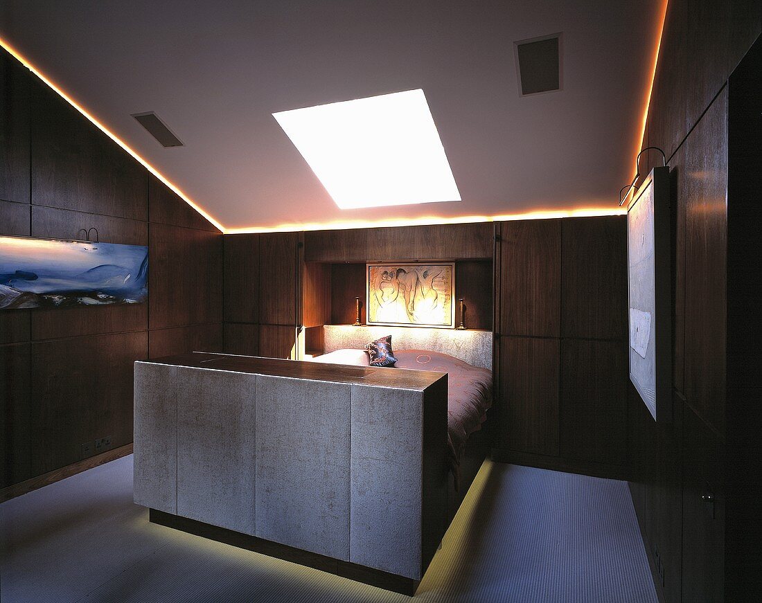 Dramatic lighting in a man's bedroom