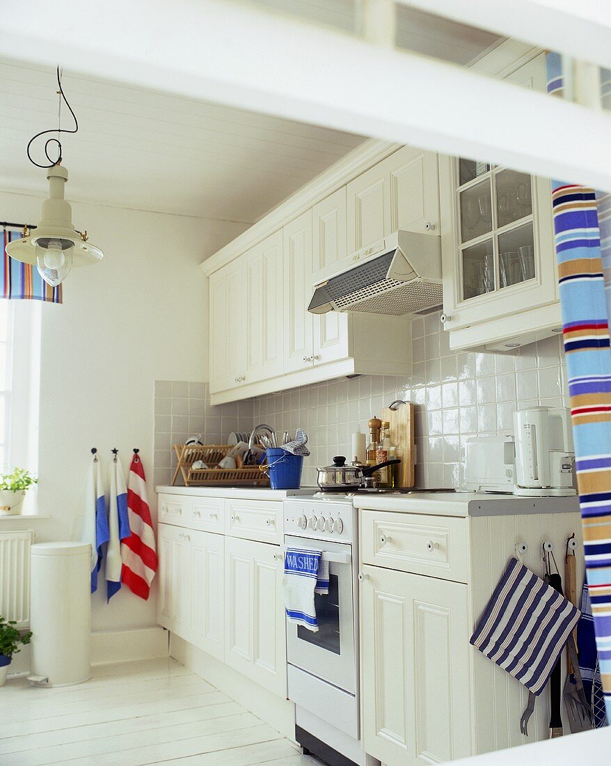 A white, country house-style kitchen