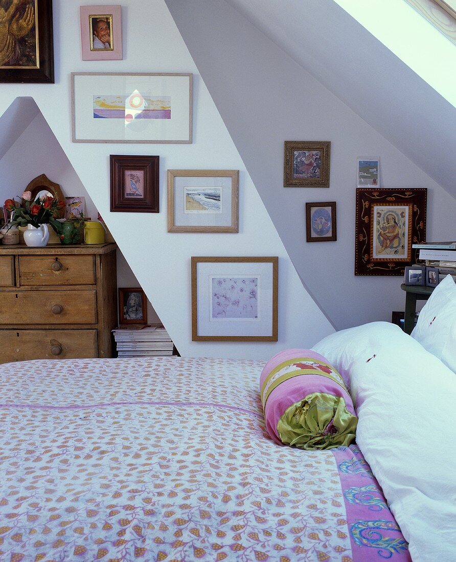 Bedroom in a country house in a converted attic