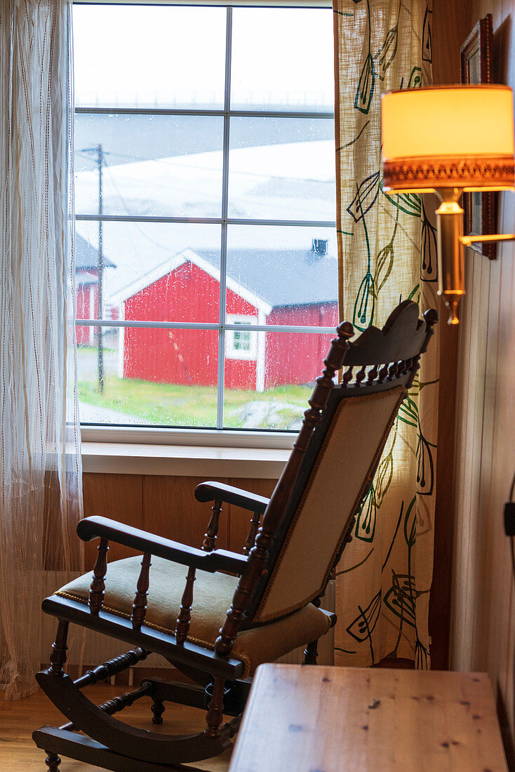Rocking chair inside a typical house, Hamnoy, Nordland, Lofoten Islands, Norway