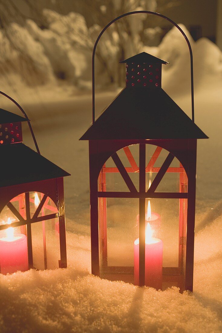 Two lanterns in snow