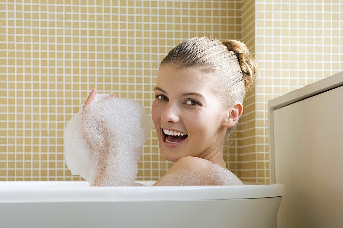 A woman taking a bath
