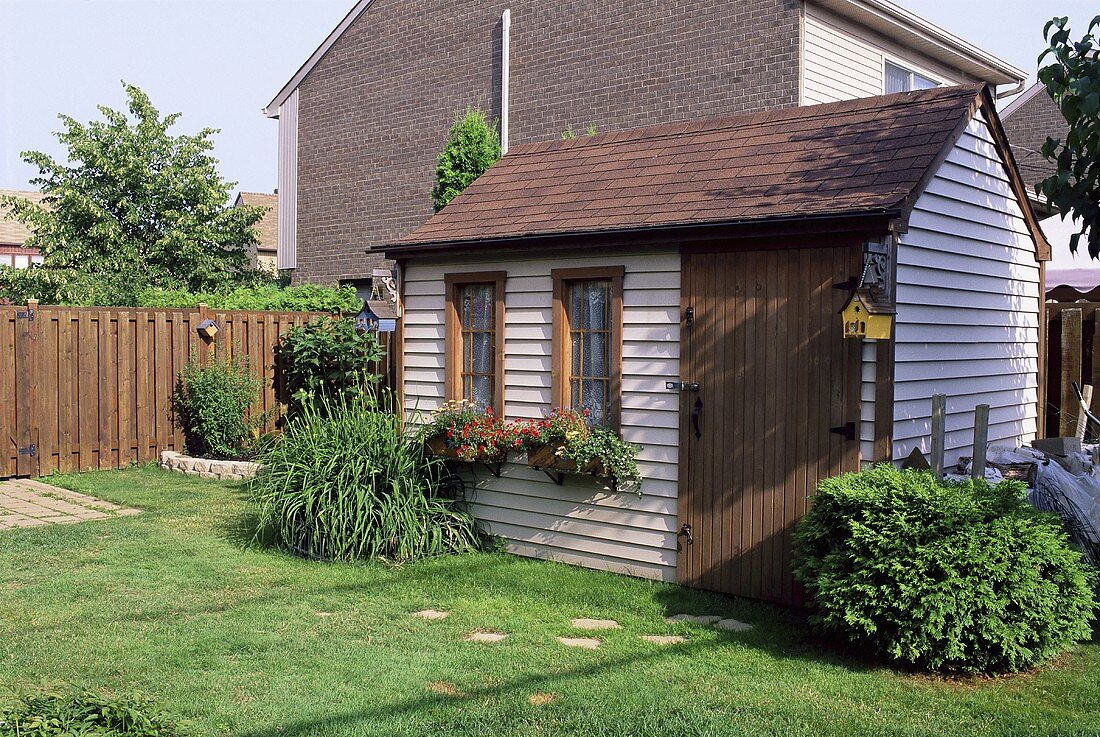 A wooden garden house