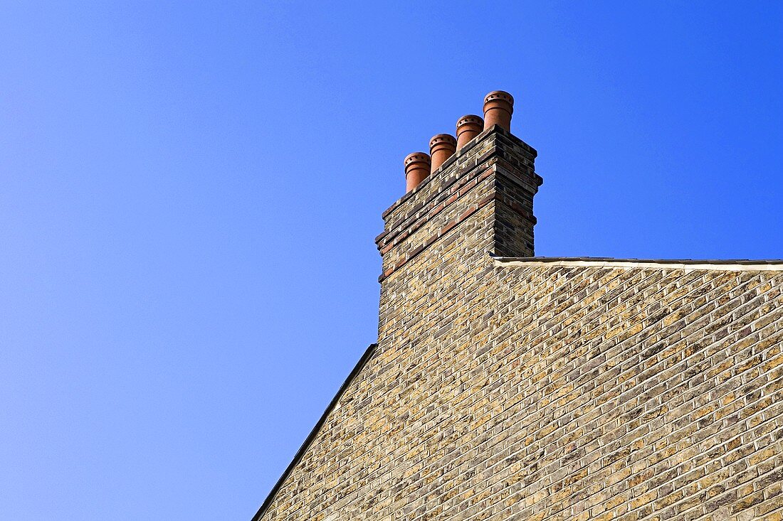 A chimney and the side of a house