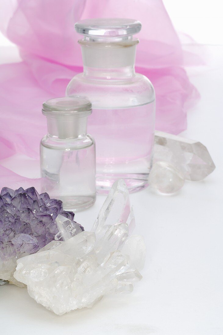 Quartz crystals, amethyst and apothecary bottles