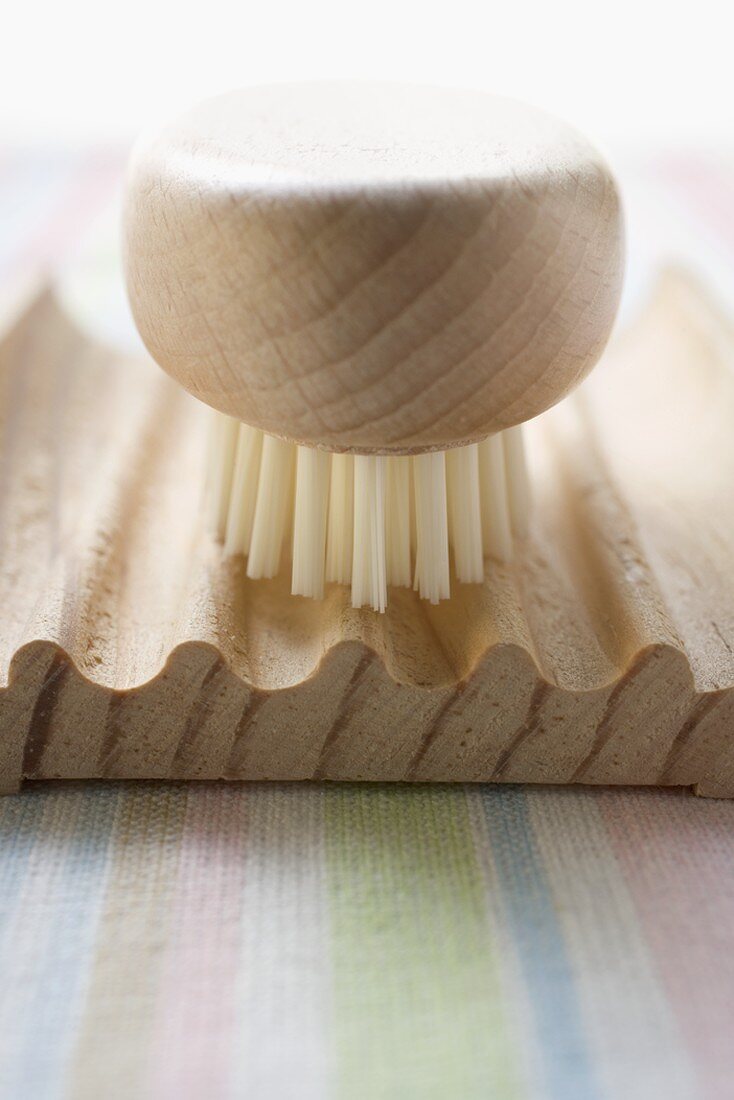Wooden soap dish with brush