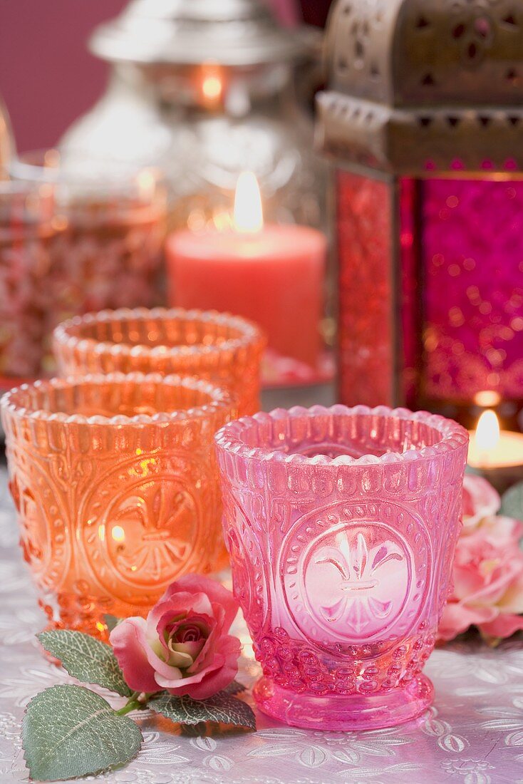 Middle Eastern decorations: windlights, roses, lantern, candles