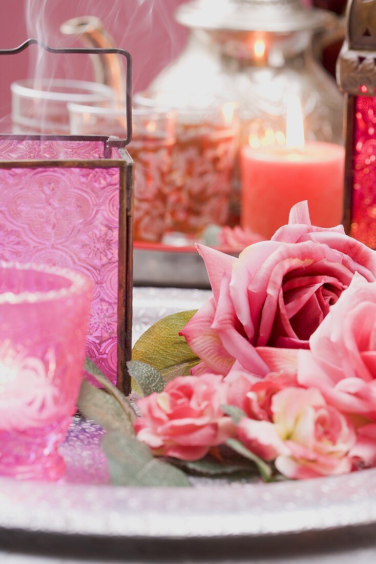 Middle Eastern decorations: windlights, roses and candles