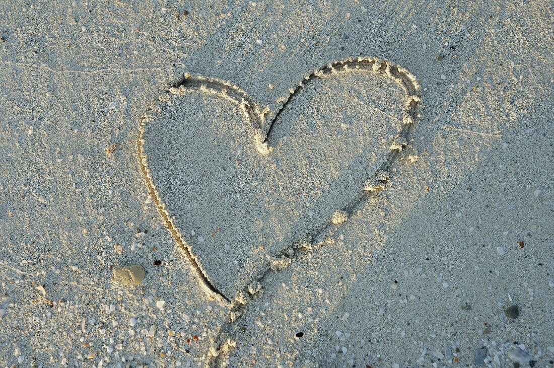 Heart drawn in sand