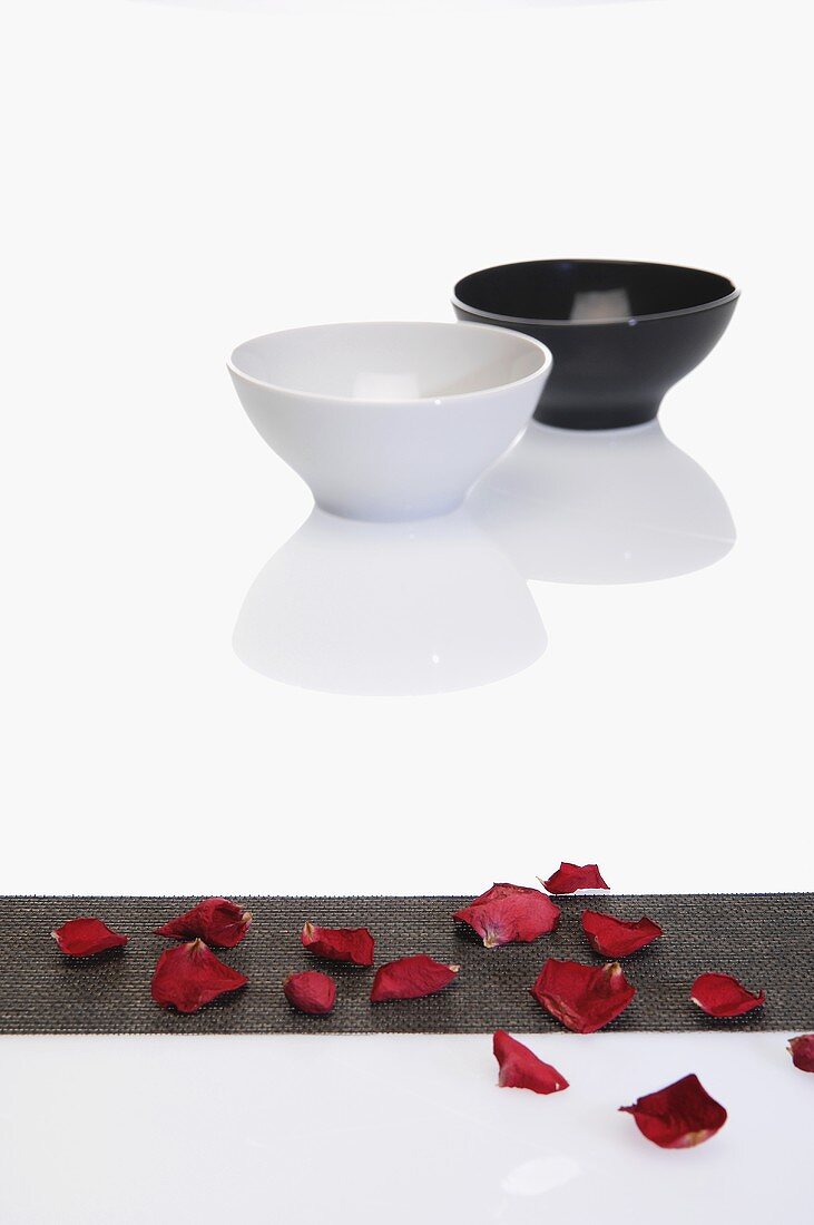 Rose petals and two bowls