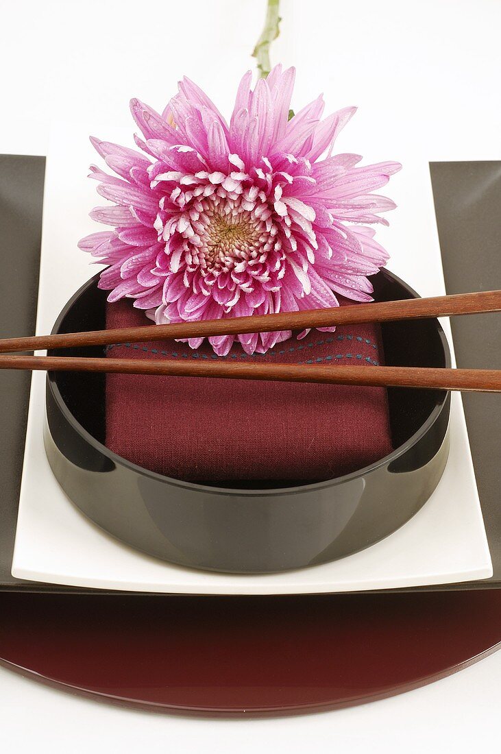 Asian place-setting with flower