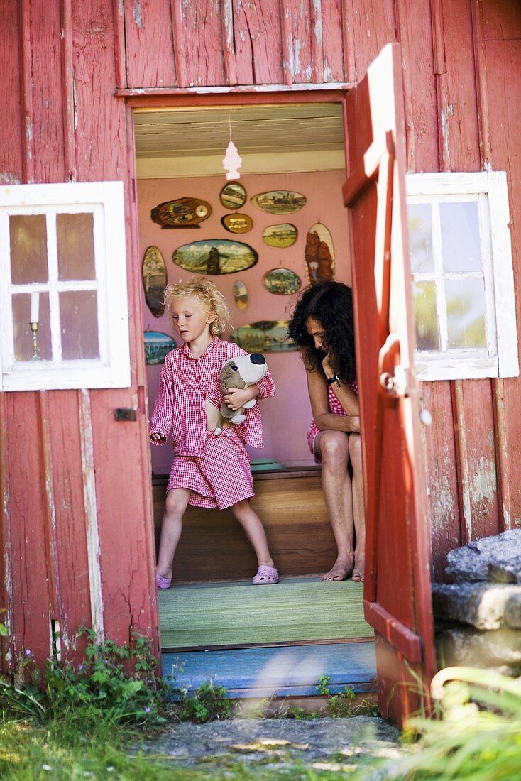 Mother and daughter in the toilet