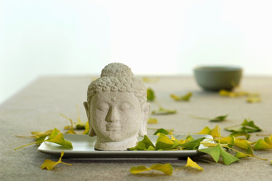 Buddha head on tray, close-up